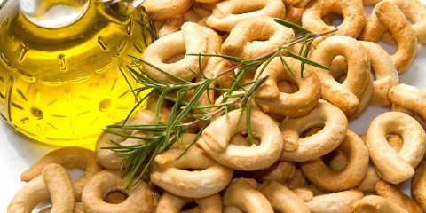 Close up shot of Italian taralli, traditional bakery product isolated on white