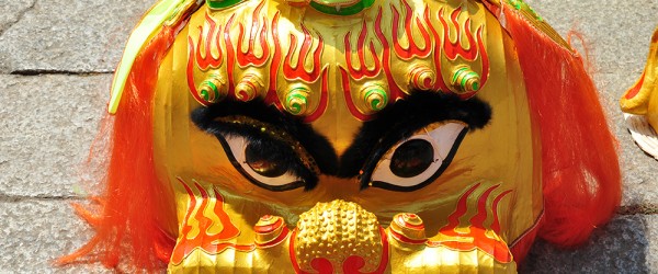 Closeup of a Lion dance mask on the ground